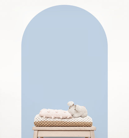 Baby blue arch wall decal creating a soft feature wall in a modern nursery
