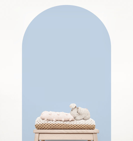 Baby blue arch wall decal creating a soft feature wall in a modern nursery