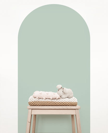 Duck egg blue arch wall decal in a close up view, creating a soft blue-green feature wall in a modern nursery