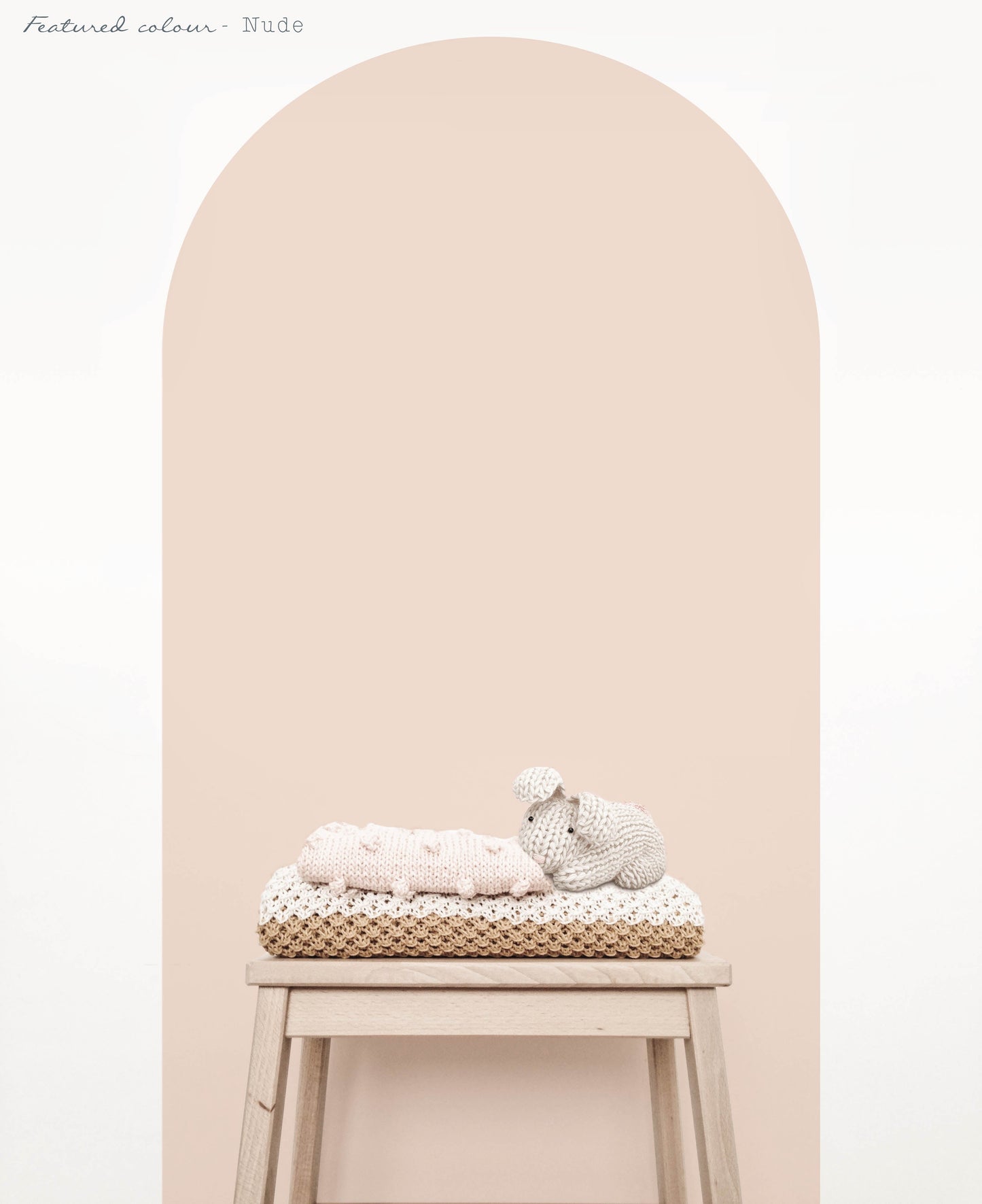 Close up of nude arch wall decal creating a warm neutral feature wall in a modern nursery