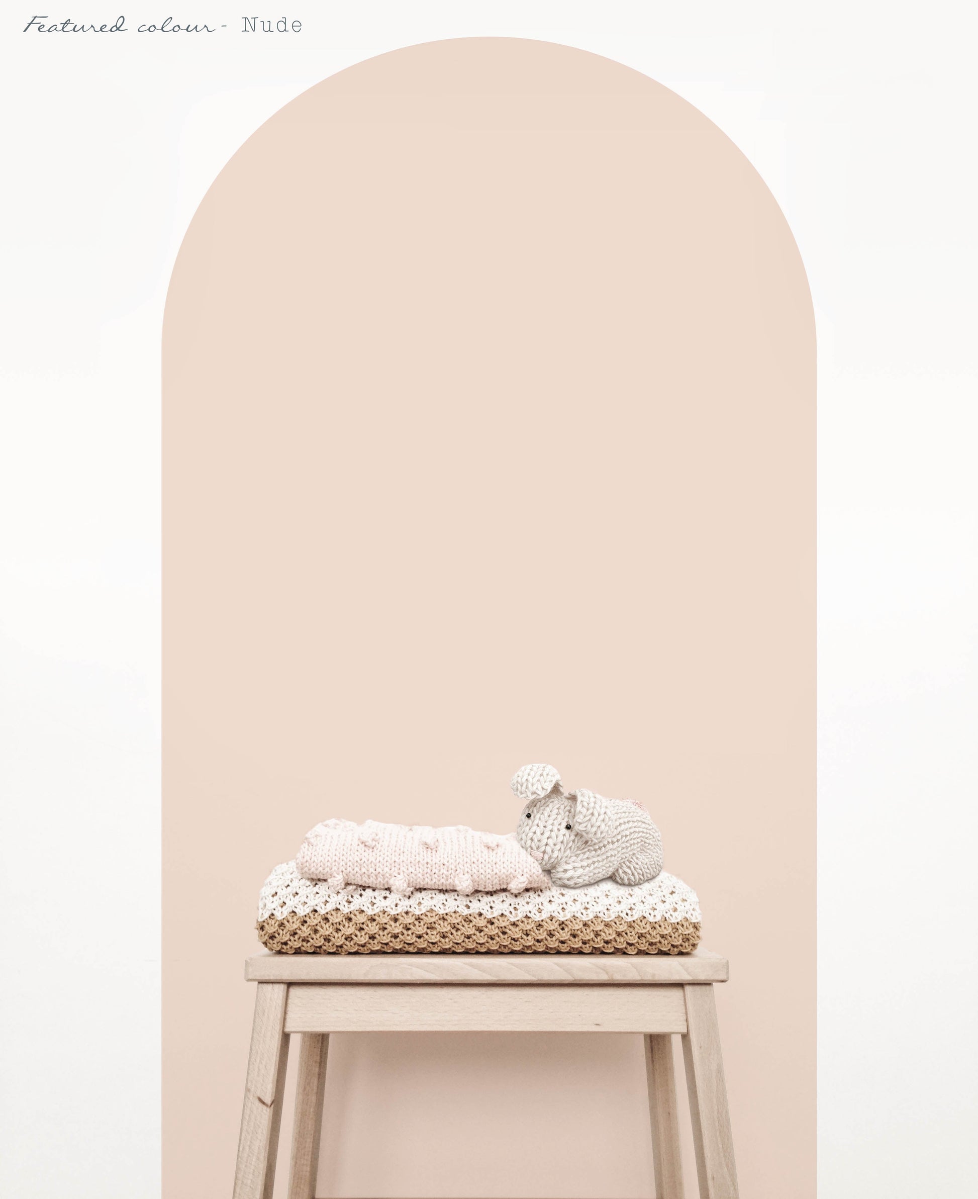 Close up of nude arch wall decal creating a warm neutral feature wall in a modern nursery