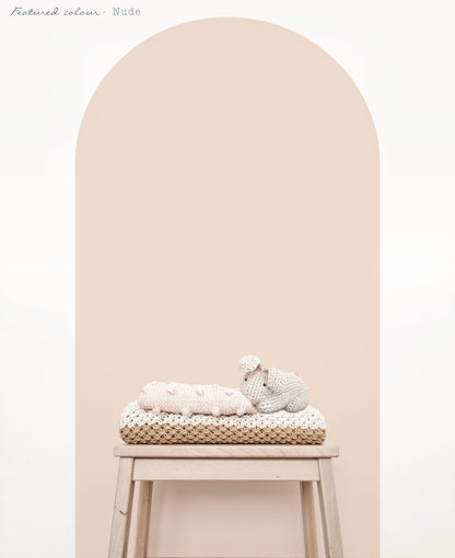 Close up of nude arch wall decal creating a warm neutral feature wall in a modern nursery