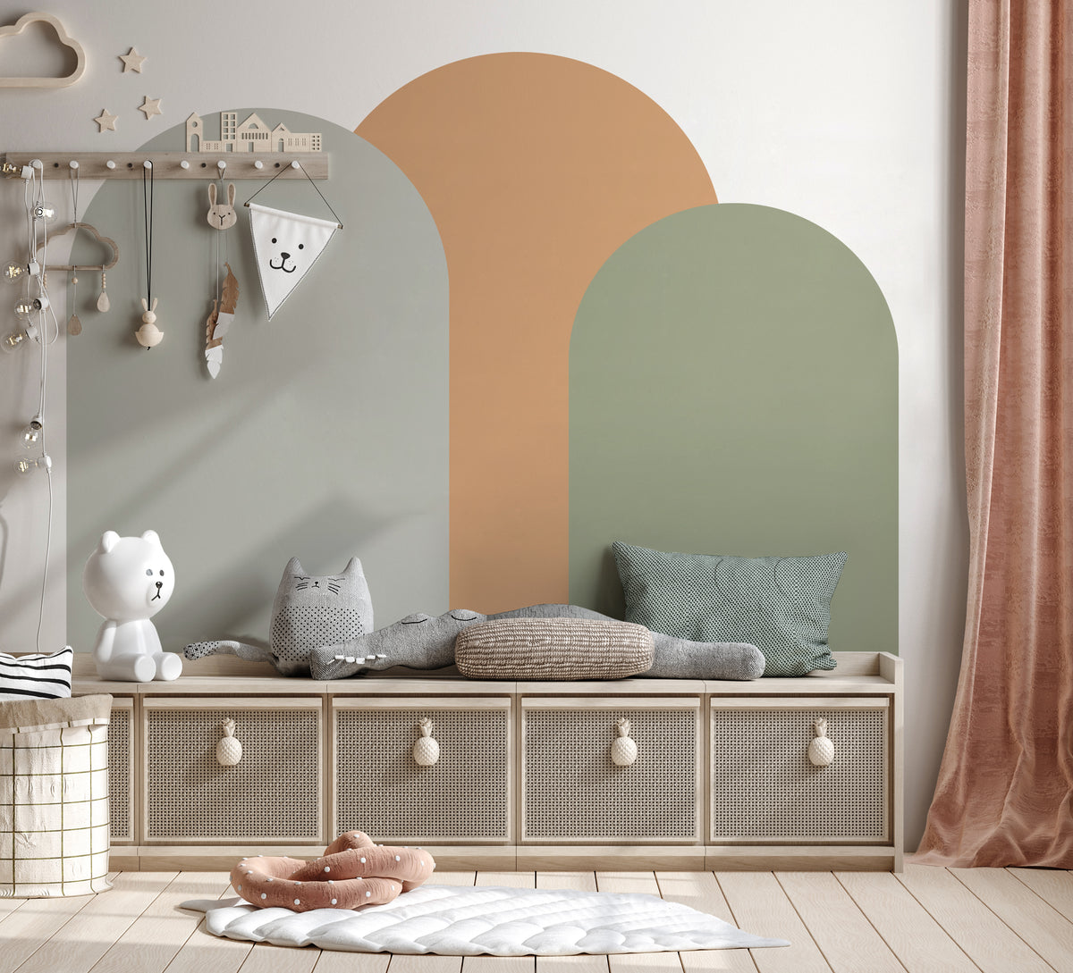 Olive green arch wall decal creating a warm earthy feature wall in a modern nursery