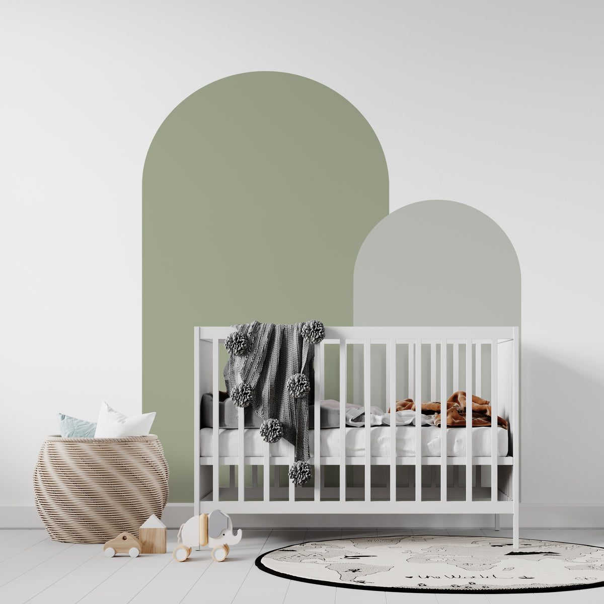Olive green arch wall decal creating a warm earthy feature wall in a modern nursery