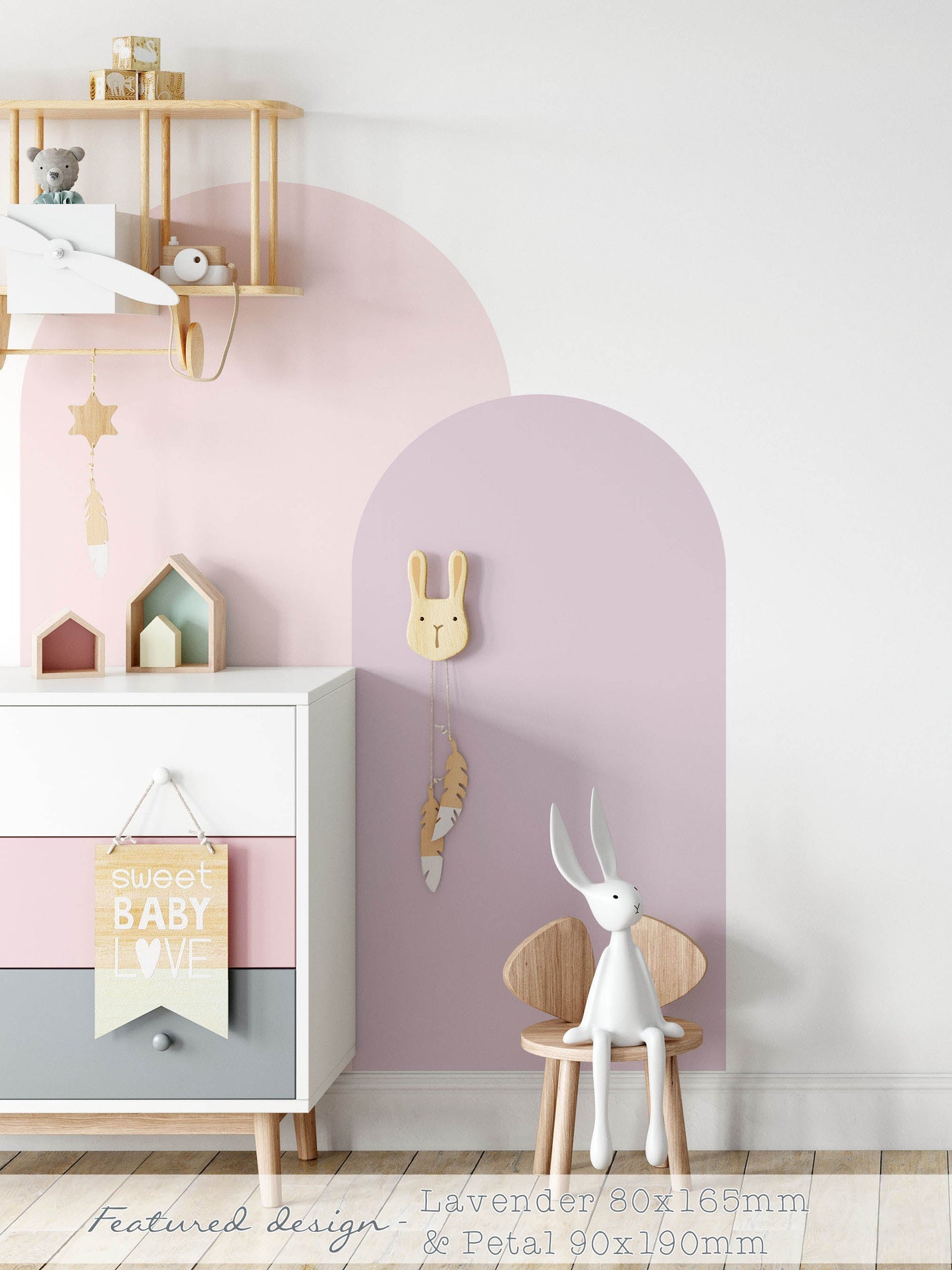 Pink and Purple arch wall decal in a nursery creating a soft pastel feature wall