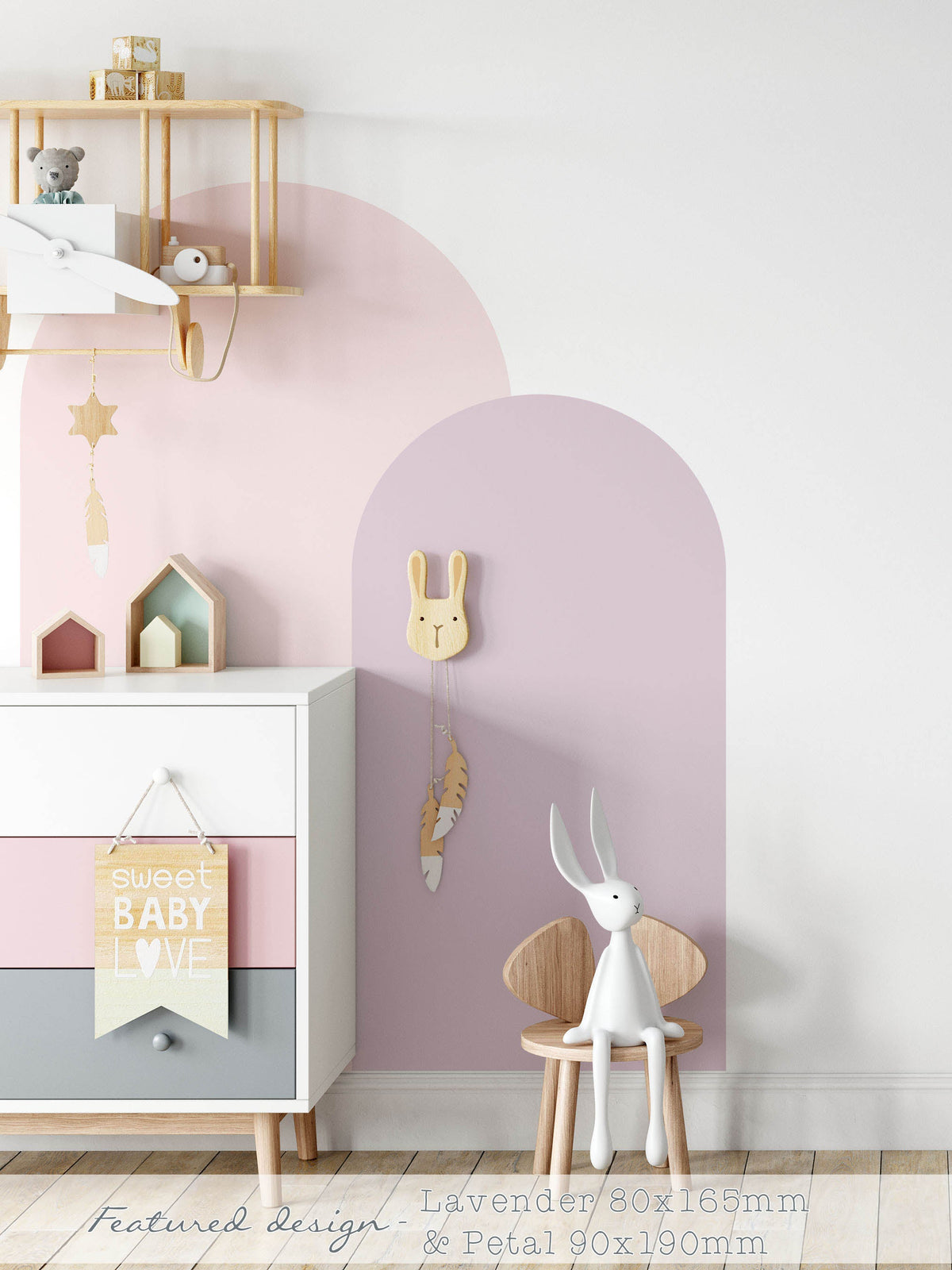 Pink and Purple arch wall decal in a nursery creating a soft pastel feature wall