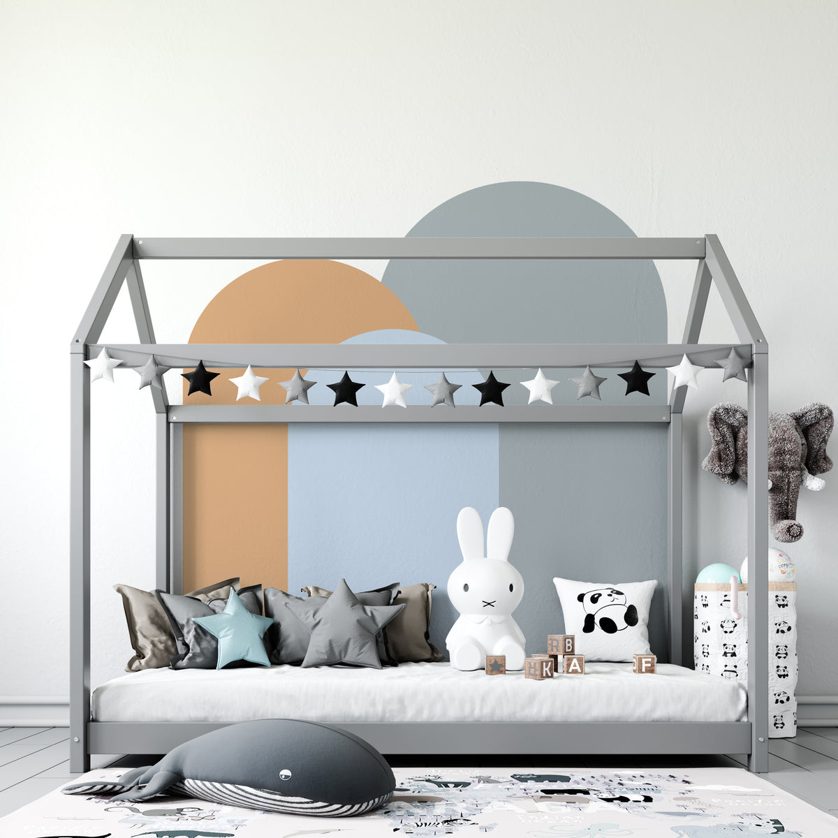 Rust arch with blue and steel arch wall decal creating a clean modern feature wall in a nursery