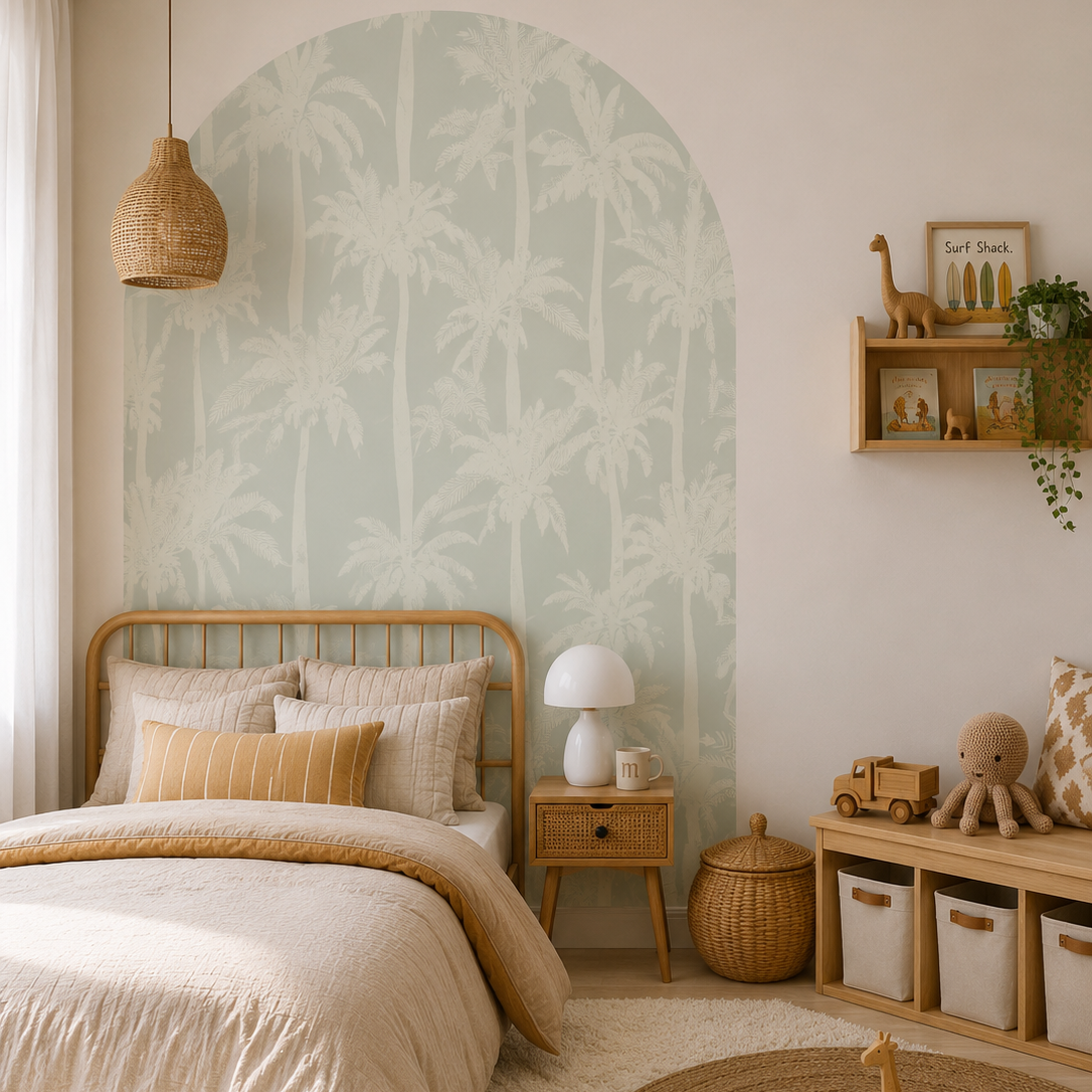 Sage Palms Arch Wall Decal behind a child's bed in a coastal nursery featuring soft sage tropical palm trees.