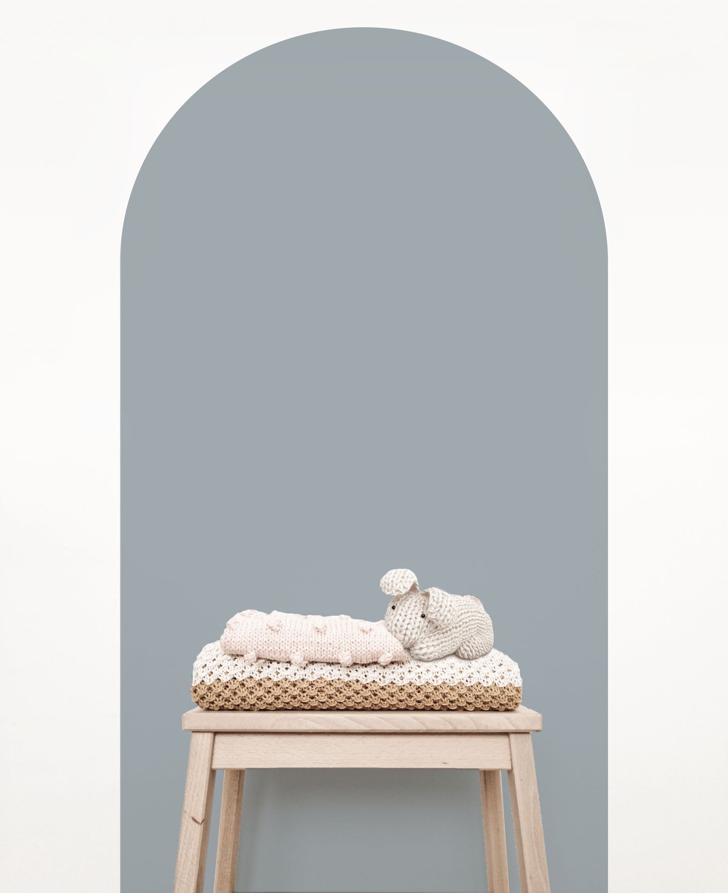 Steel blue arch wall decal creating a modern blue-grey feature wall in a nursery