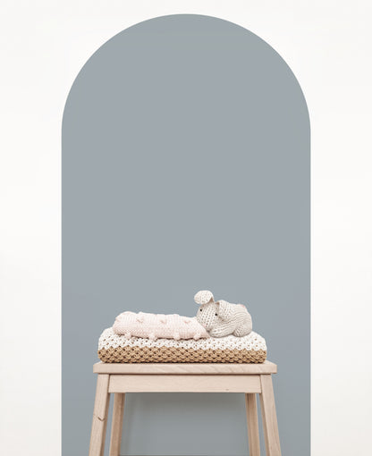 Steel blue arch wall decal creating a modern blue-grey feature wall in a nursery